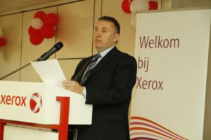 Tony McQuillan spreekt tijdens het 50-jarig jubileum van Xerox