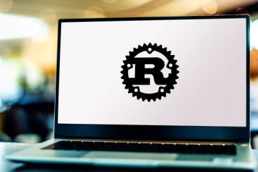 Laptop met logo van Rust op het scherm