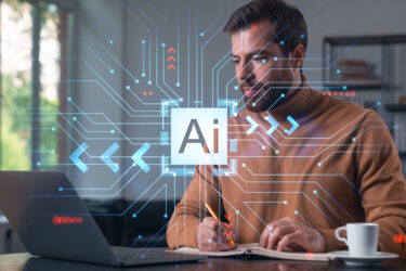 Man met laptop, de term AI in beeld