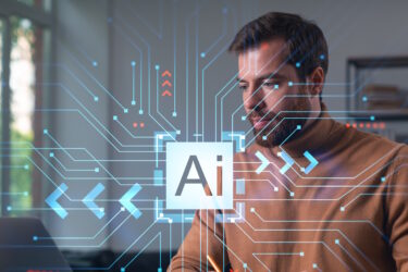 Man met laptop, de term AI in beeld