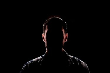 a man in the dark
